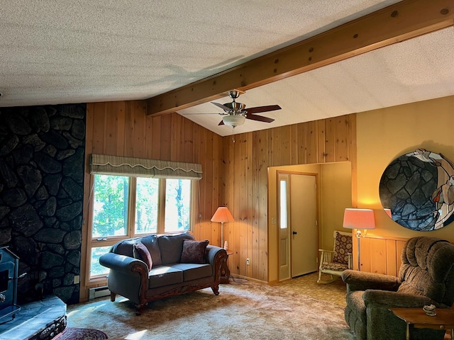 90520 Island Loop, Windemere Twp, MN 55783 - living room featuring wooden walls, vaulted ceiling with beams, ceiling fan, carpet floors, and a wood stove