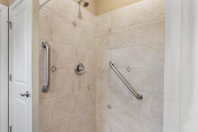 full bathroom with tiled shower