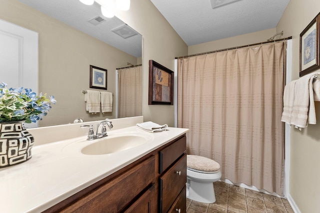 bathroom with visible vents, toilet, curtained shower, a textured ceiling, and vanity