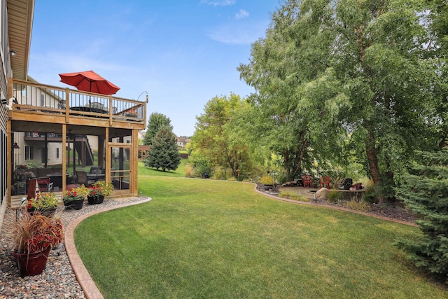 view of yard with a deck