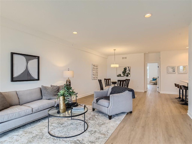 living room featuring light wood-type flooring