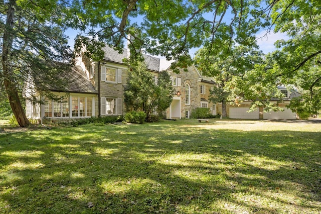 view of yard with a garage