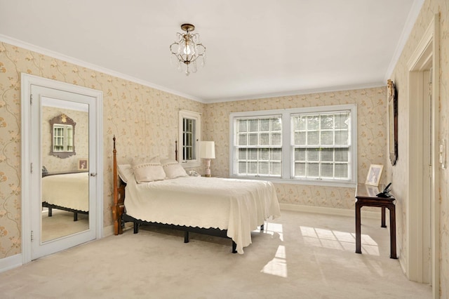 bedroom featuring crown molding, light colored carpet, and a notable chandelier