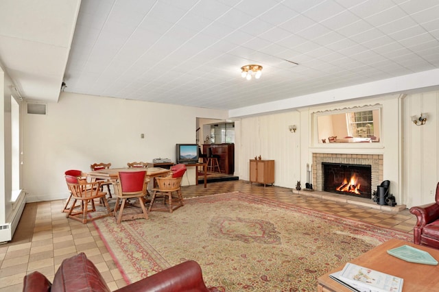 living room featuring a fireplace