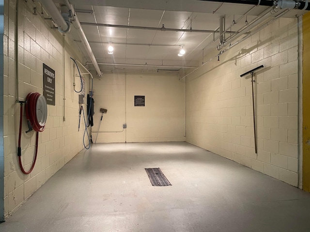 5601 Dewey Hill Rd Unit 113, Edina, MN 55439 - below grade area featuring concrete block wall