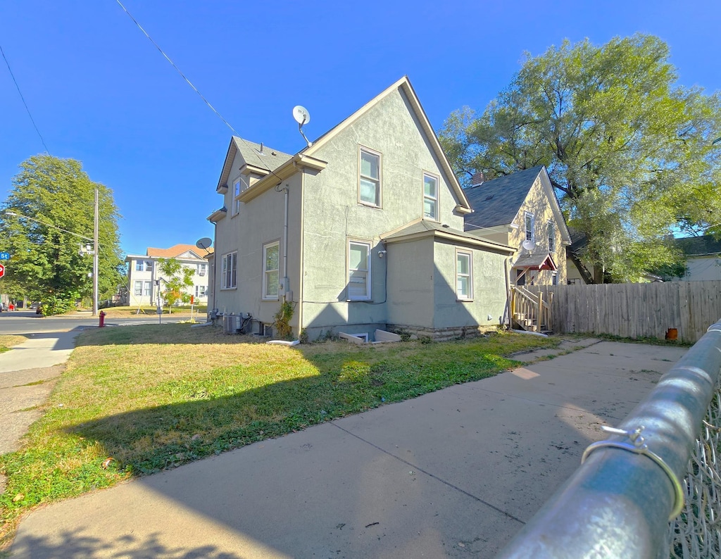 back of house with a yard