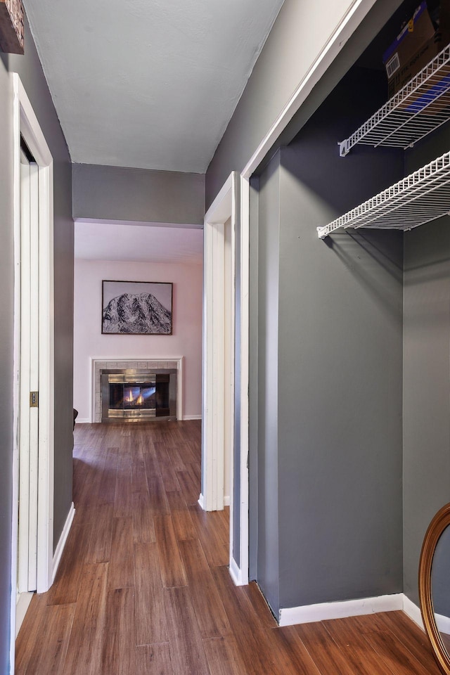 hallway featuring dark hardwood / wood-style floors