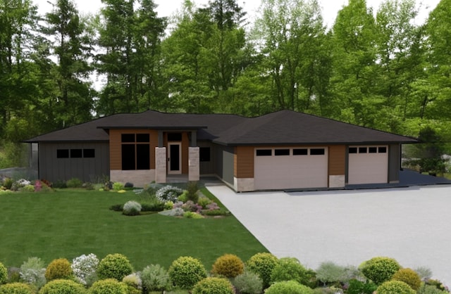 prairie-style house with a garage and a front lawn