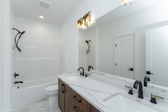 full bathroom with shower / tub combination, vanity, and toilet