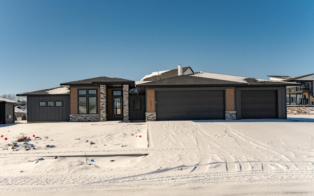 view of front of property featuring a garage