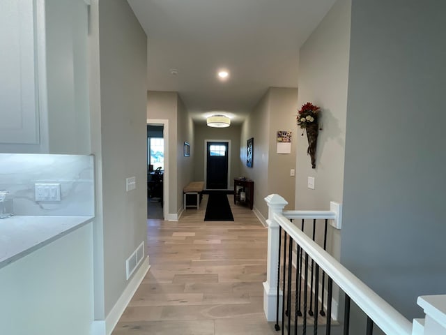 hallway featuring light hardwood / wood-style floors