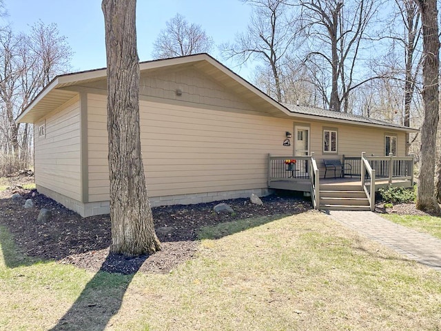 7983 County Road 127, Brainerd, MN 56401 - view of front of property with a deck and a front lawn