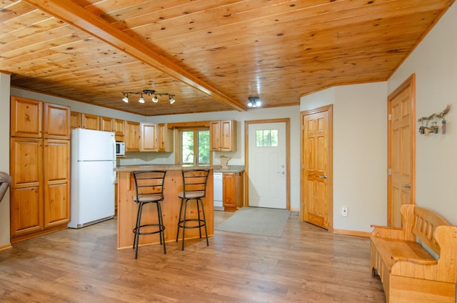7983 County Road 127, Brainerd, MN 56401 - kitchen with white appliances, a breakfast bar area, wood ceiling, light wood-style flooring, and a kitchen island