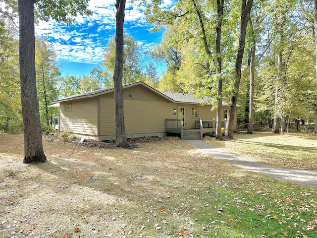 7983 County Road 127, Brainerd, MN 56401 - view of home's exterior featuring a deck