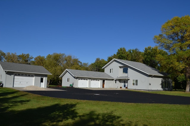 view of side of home with a yard