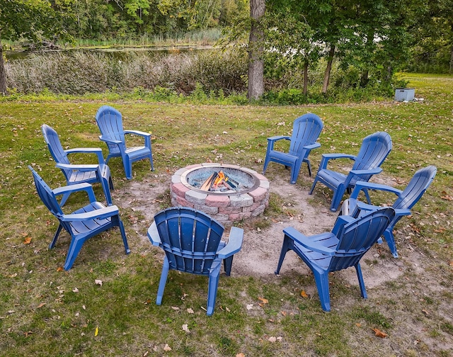 view of yard with an outdoor fire pit