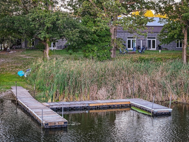 view of dock with a water view