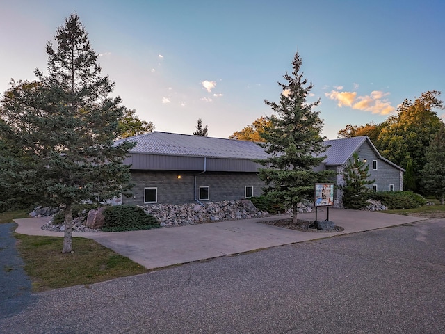 view of property exterior at dusk