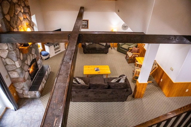 playroom featuring a stone fireplace