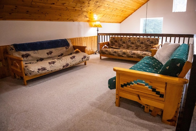 carpeted living room with wood ceiling, lofted ceiling, and wood walls