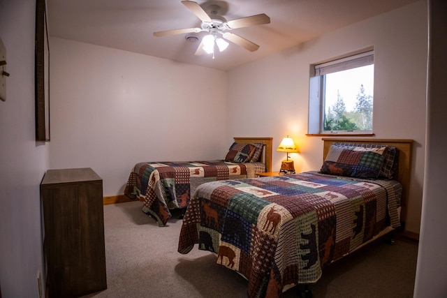 bedroom with ceiling fan and carpet