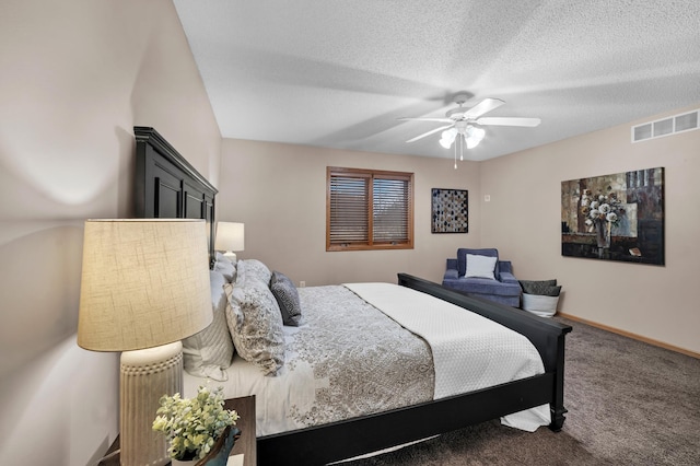 bedroom with baseboards, visible vents, a ceiling fan, a textured ceiling, and carpet flooring