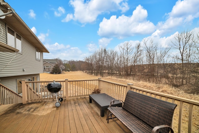 wooden terrace with area for grilling