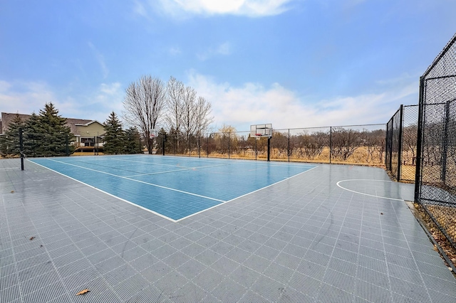 view of sport court with community basketball court and fence