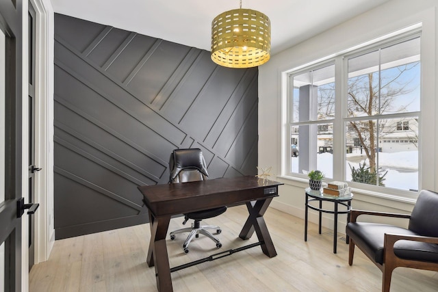 home office with light wood-type flooring