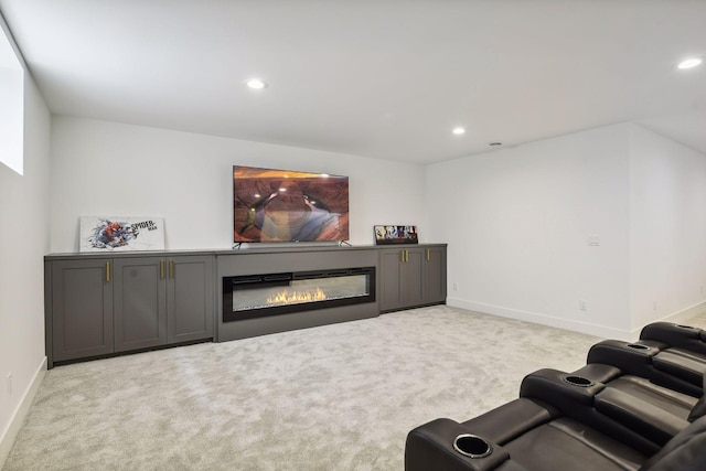 cinema room with light carpet