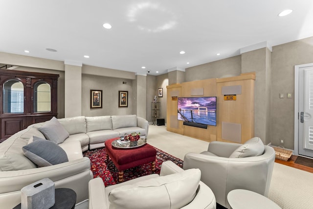 carpeted living room with recessed lighting