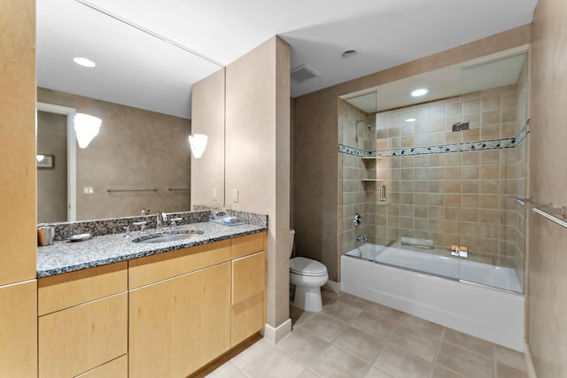 bathroom with vanity, tile patterned flooring, shower / tub combination, toilet, and visible vents