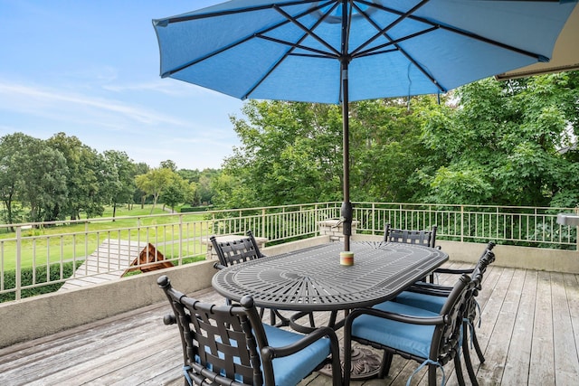 deck featuring outdoor dining space