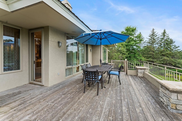 deck featuring outdoor dining space