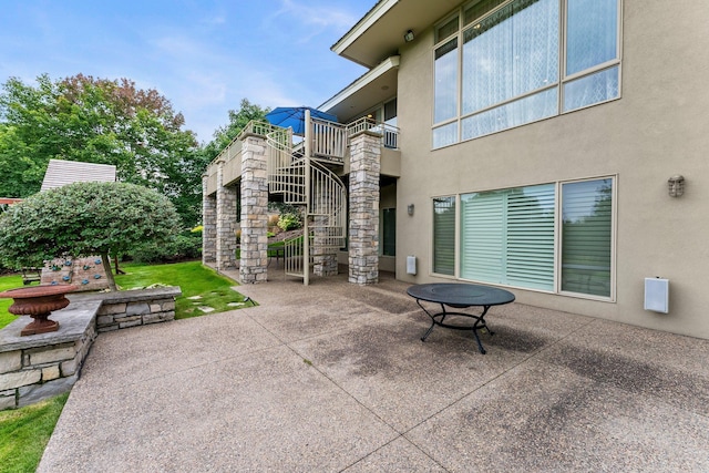 view of patio featuring stairs