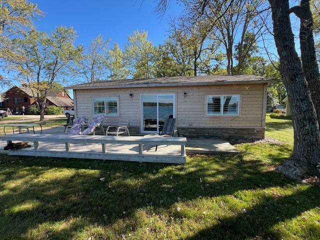 42911 County Highway 53, Pine Lake Twp, MN 56567 - back of property with a yard and a deck