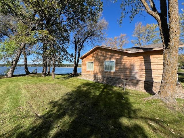 42911 County Highway 53, Pine Lake Twp, MN 56567 - view of property exterior with a water view and a yard