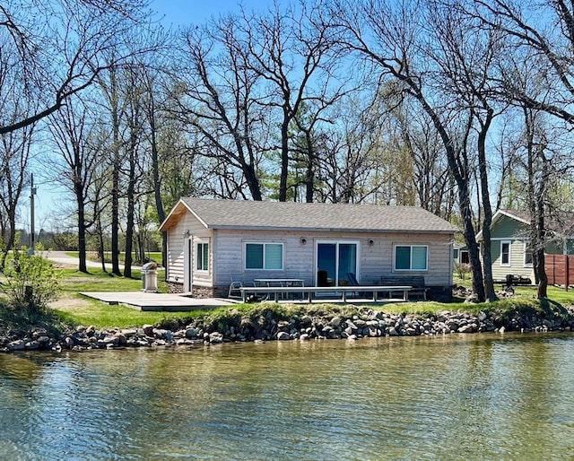 42911 County Highway 53, Pine Lake Twp, MN 56567 - view of front of house with a water view and a front yard