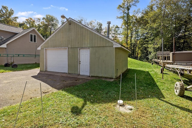 garage with a yard