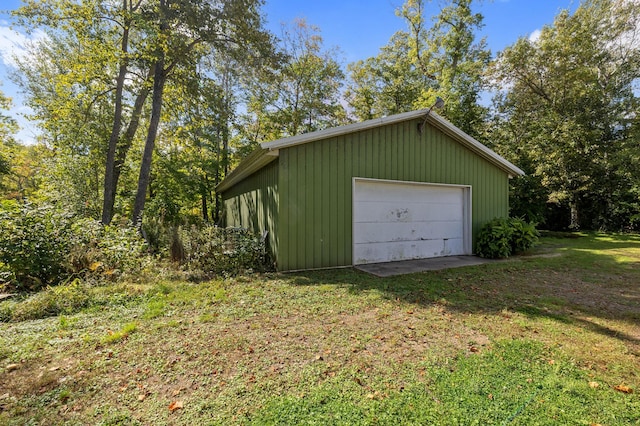 garage with a yard