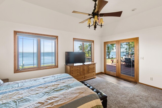 bedroom with access to outside, ceiling fan, and light hardwood / wood-style flooring