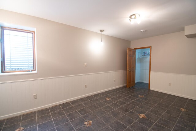 view of tiled spare room