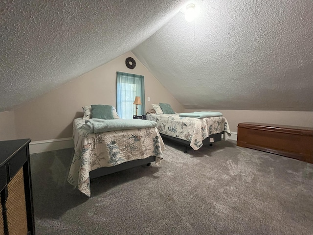 carpeted bedroom with vaulted ceiling and a textured ceiling