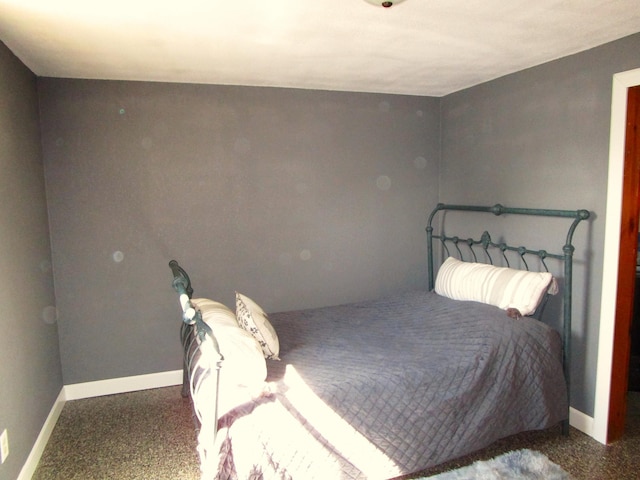 506 Ash Ave N, New Richland, MN 56072 - bedroom with baseboards