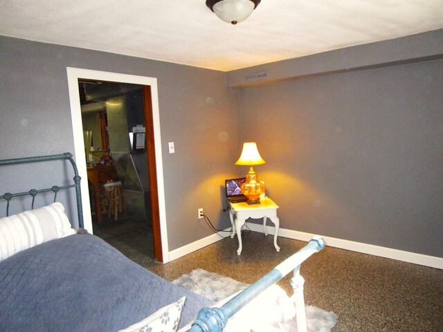 506 Ash Ave N, New Richland, MN 56072 - bedroom featuring baseboards