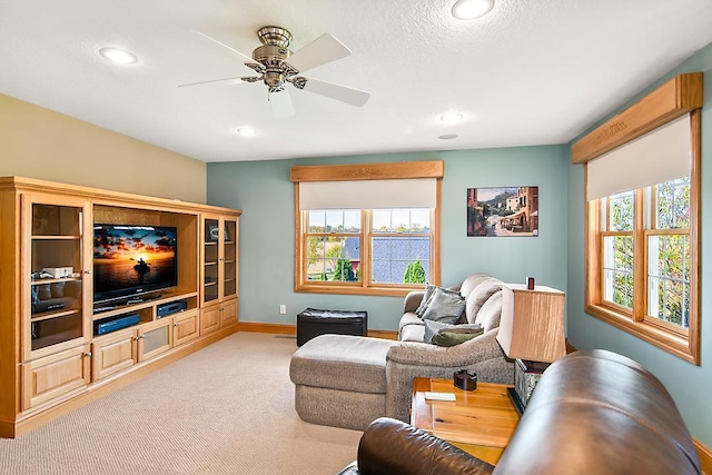 living room with recessed lighting, a ceiling fan, baseboards, and carpet floors