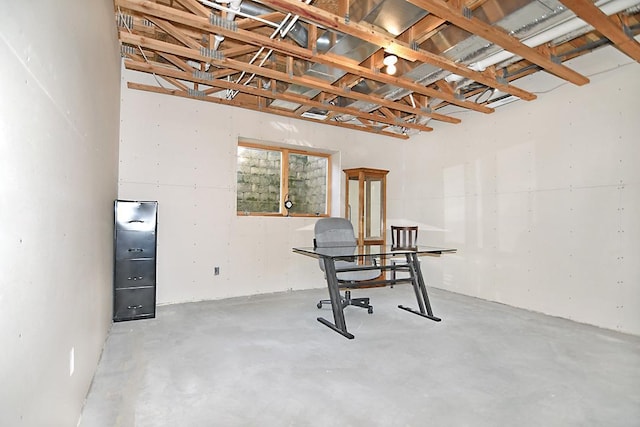 office area with concrete floors