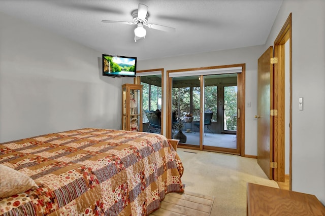 carpeted bedroom featuring a textured ceiling, ceiling fan, and access to exterior