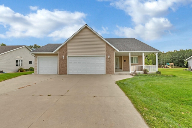 ranch-style house featuring a garage, a front lawn, and covered porch