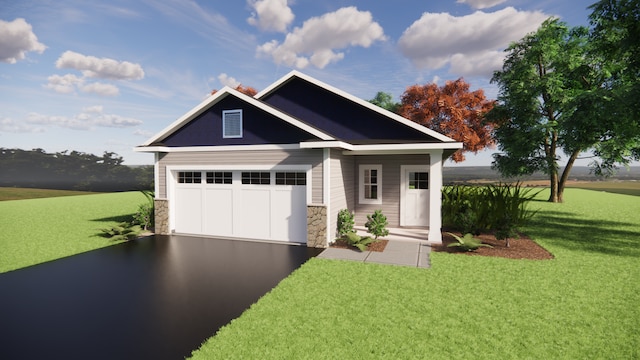 view of front facade with a garage and a front lawn